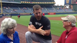 Summer 2014 - Author, Lael Arrington (L) and her husband Jack (R) talking with their friend, White Sox hitter Adam LaRoche, who suddenly retired from baseball recently.