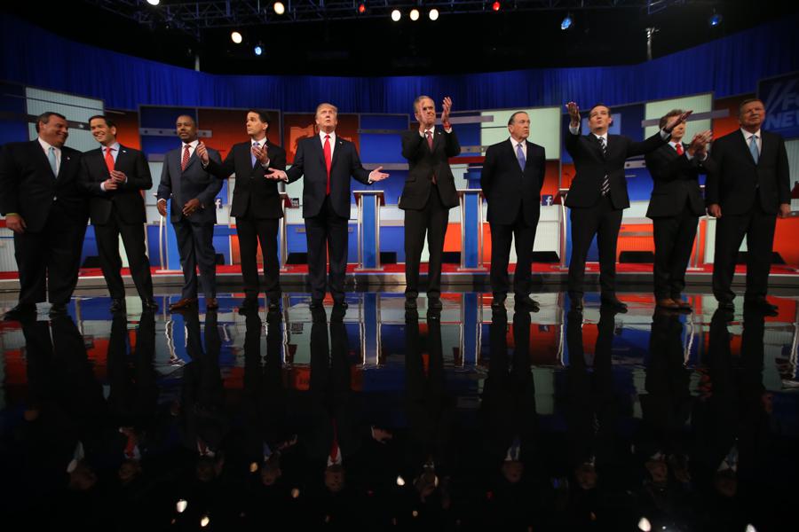 Republican presidential candidates from left, Chris Christie, Marco Rubio, Ben Carson, Scott Walker, Donald Trump, Jeb Bush, Mike Huckabee, Ted Cruz, Rand Paul, and John Kasich take the stage for the first Republican presidential debate at the Quicken Loans Arena Thursday, Aug. 6, 2015, in Cleveland. (AP Photo/Andrew Harnik)