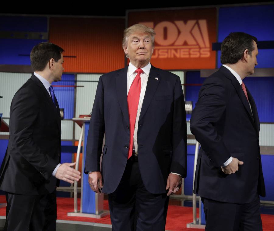 Republican presidential candidate, businessman Donald Trump stands on the stage before the Fox Business Network Republican presidential debate at the North Charleston Coliseum, Thursday, Jan. 14, 2016, in North Charleston, S.C. (AP Photo/Chuck Burton)