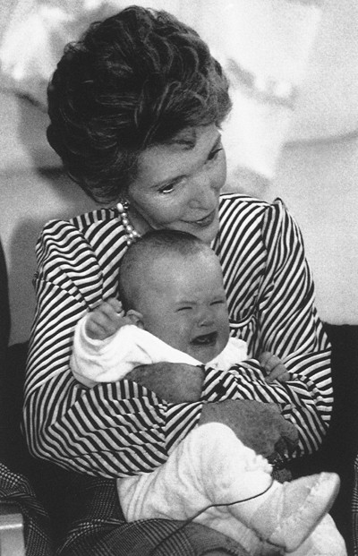 United StatesFirst Lady Nancy Reagan tries to comfort 6 month old Robert Hynynen during a visit at Moringen women's treatment center outside Stockholm on Tuesday, June 9, 1987. Roberts mother Marie Hynynen is one of the former drug addicts who are at the center for treatment. Mrs. Reagan arrived yesterday from Venice for a three day visit here to study combat against drug abuse.